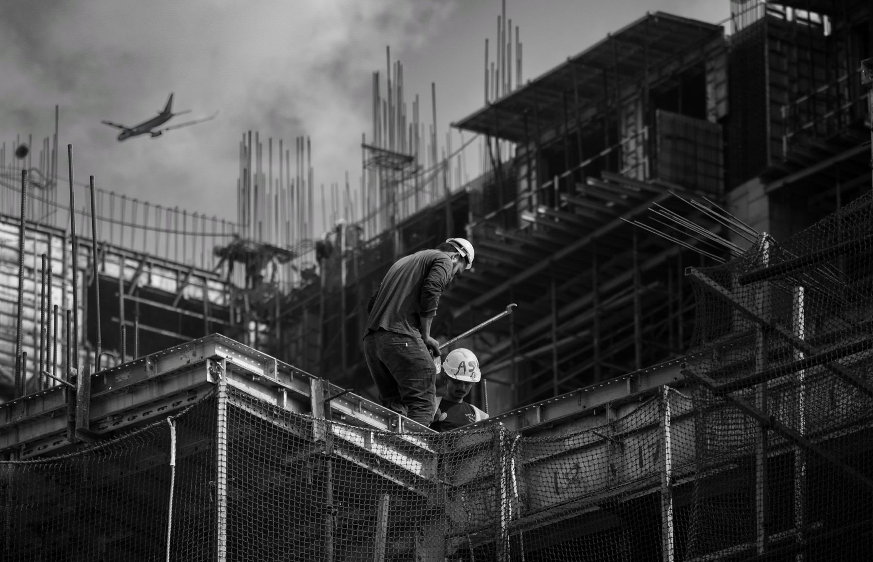 Construction workers on an urban building site.